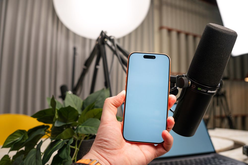 A person typing on a phone — writing a short video prompt