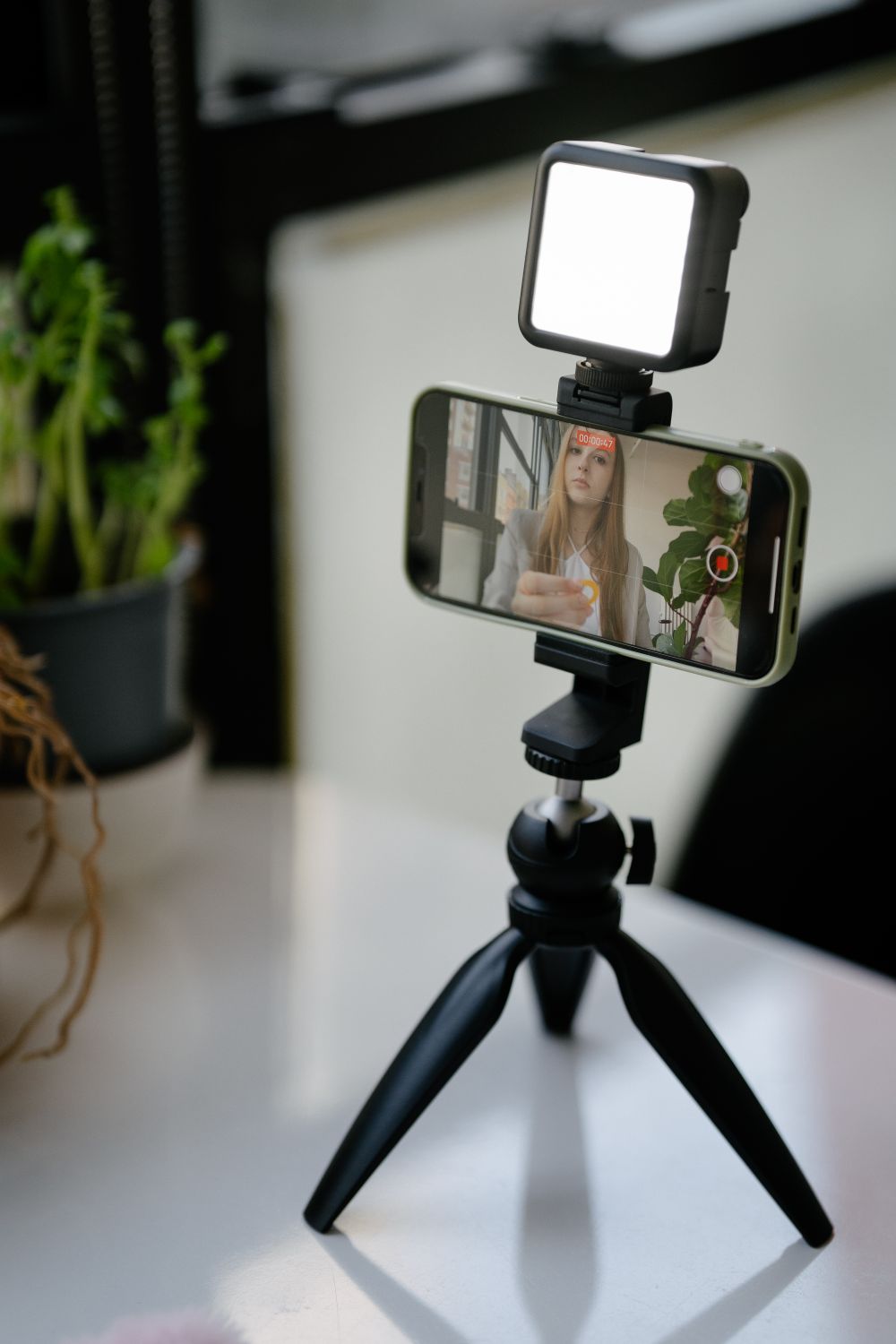 A creator editing a vertical video on a phone
